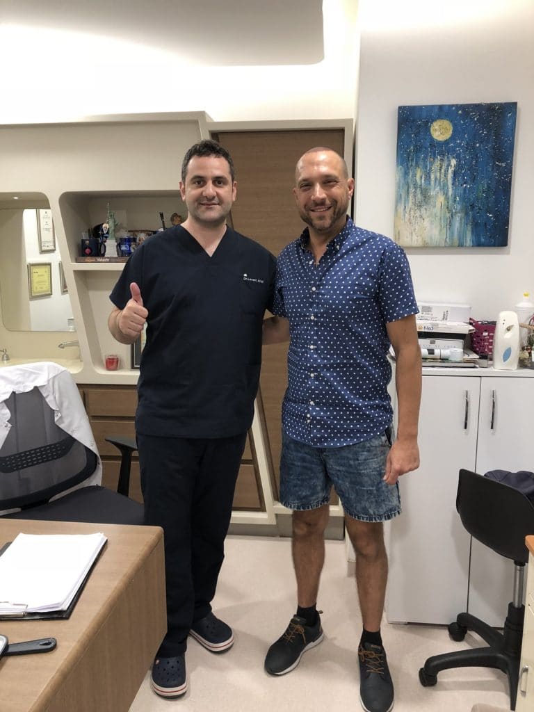 Dr-Acar-FUE-hair-transplant-with-patient