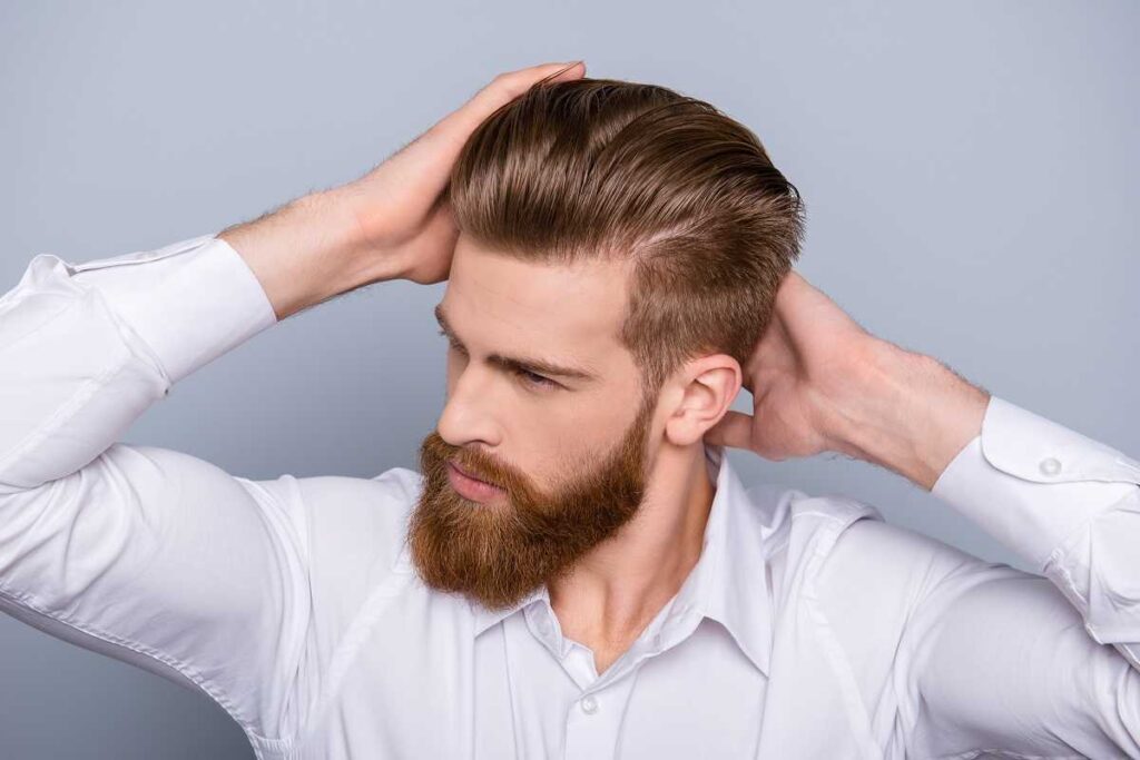 hombre con pelo y barba poblados