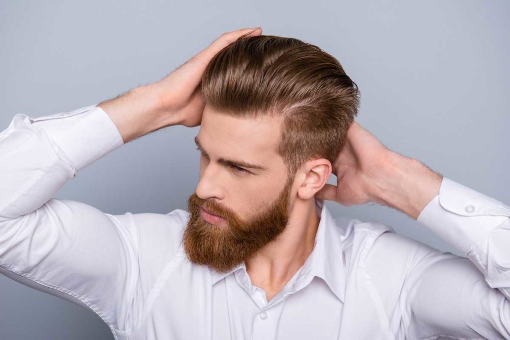 man with full hair and full beard